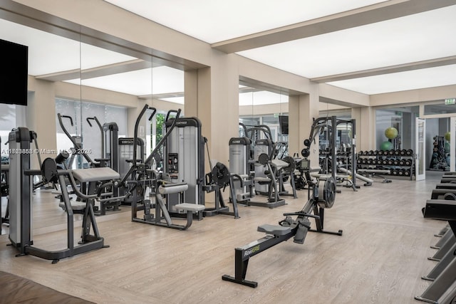 gym with hardwood / wood-style floors