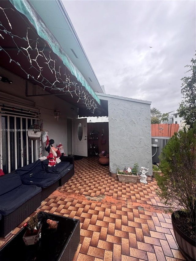 view of patio featuring central AC