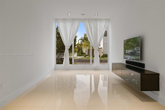 interior space with light tile patterned floors