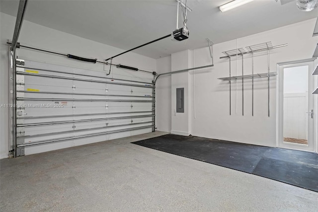 garage featuring a garage door opener and electric panel