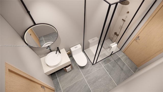 bathroom with a shower with shower door and toilet