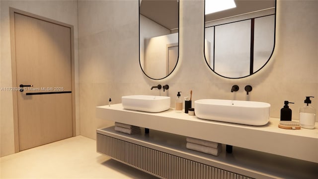 bathroom with vanity and tile walls