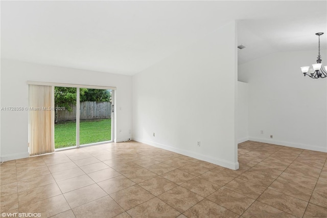 11030 SW 165th Ter, Miami, FL 33157 - spare room featuring vaulted ceiling, a chandelier, tile patterned flooring, and baseboards