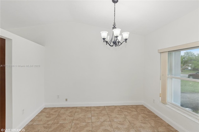 spare room featuring vaulted ceiling, a chandelier, and light tile patterned flooring