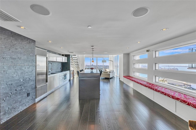 living room featuring dark hardwood / wood-style floors