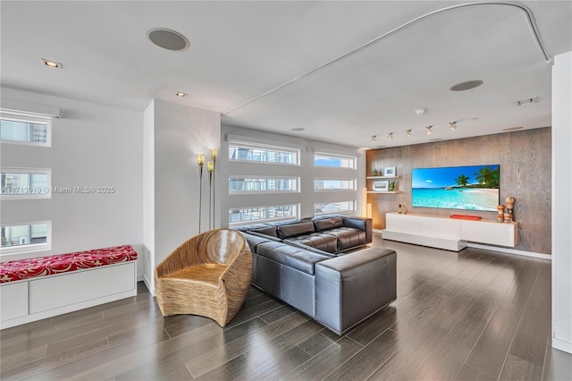 living room featuring dark hardwood / wood-style flooring