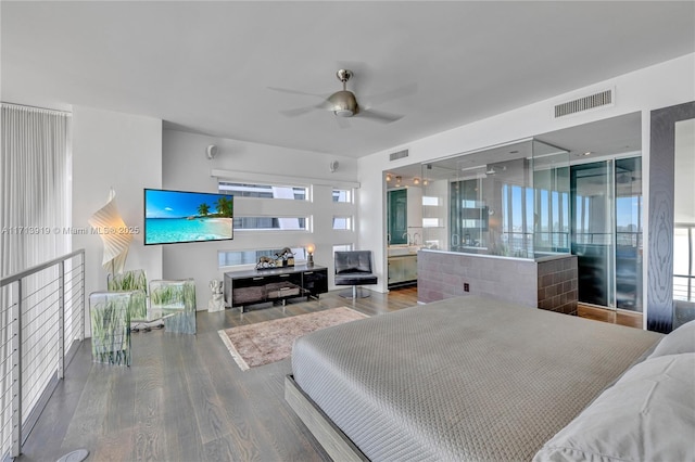 bedroom featuring ceiling fan and hardwood / wood-style flooring