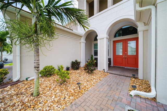 doorway to property featuring french doors