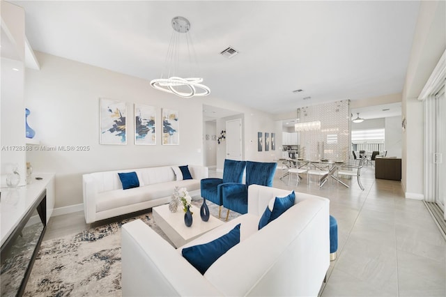 living room with an inviting chandelier