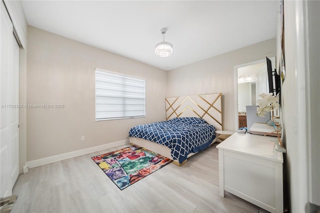 bedroom featuring light hardwood / wood-style flooring