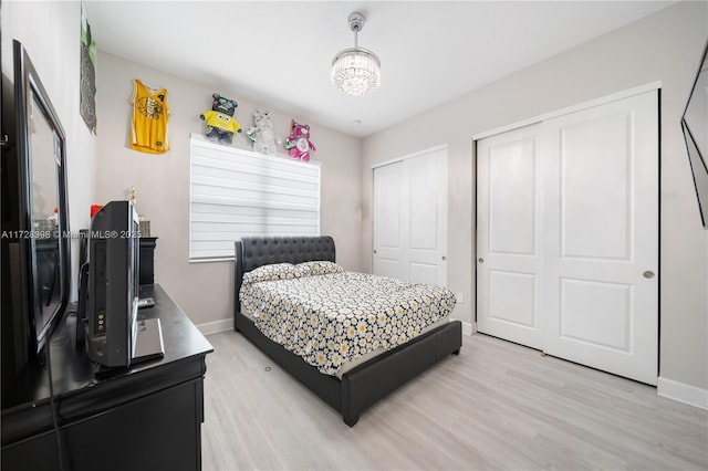 bedroom with light hardwood / wood-style flooring