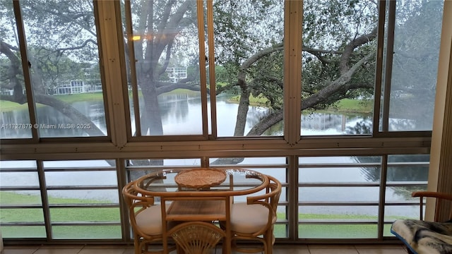 sunroom with a water view