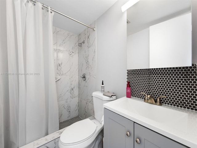 bathroom featuring walk in shower, vanity, toilet, and tasteful backsplash