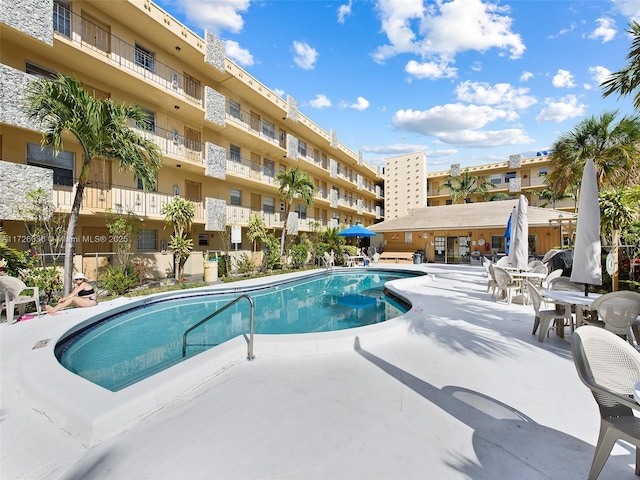 view of pool featuring a patio area