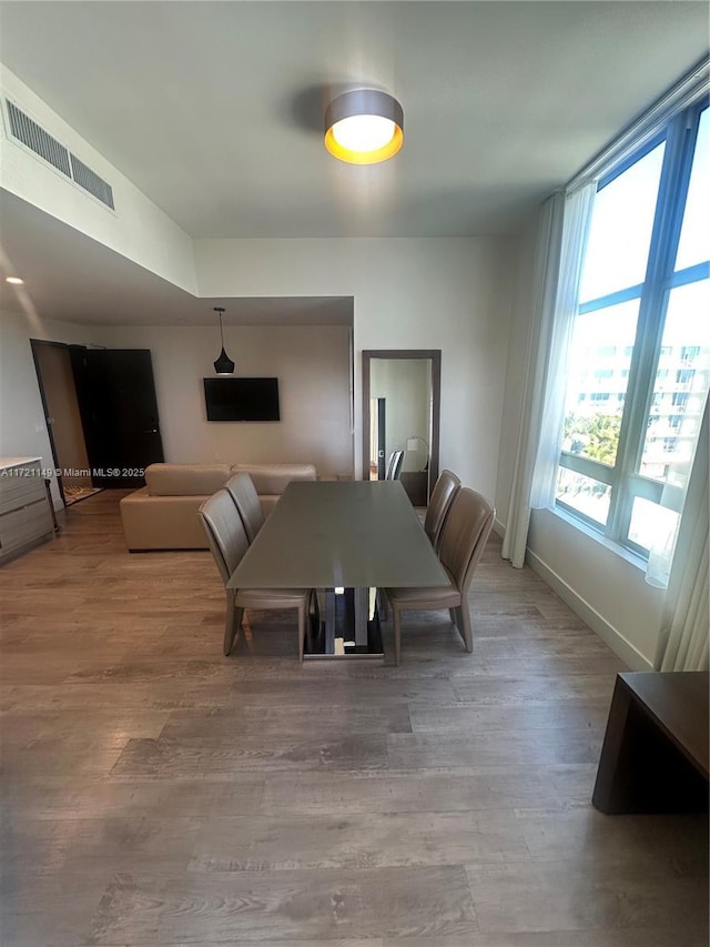 unfurnished dining area with hardwood / wood-style flooring