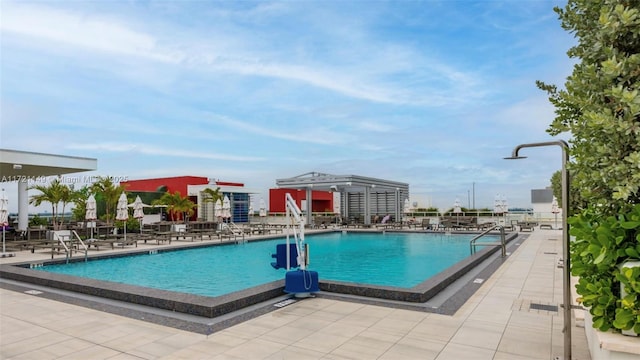 view of pool featuring a patio