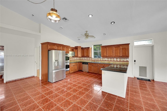 kitchen with ceiling fan, stainless steel appliances, backsplash, a wealth of natural light, and sink