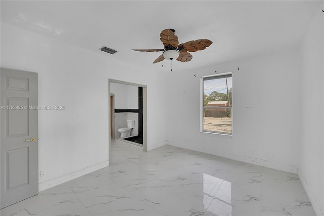 spare room featuring ceiling fan