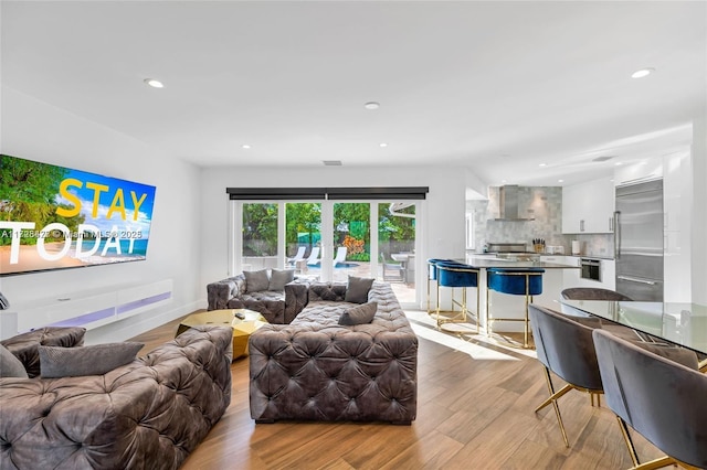 living room featuring light wood-type flooring