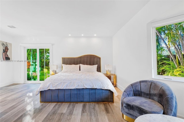 bedroom with light hardwood / wood-style flooring