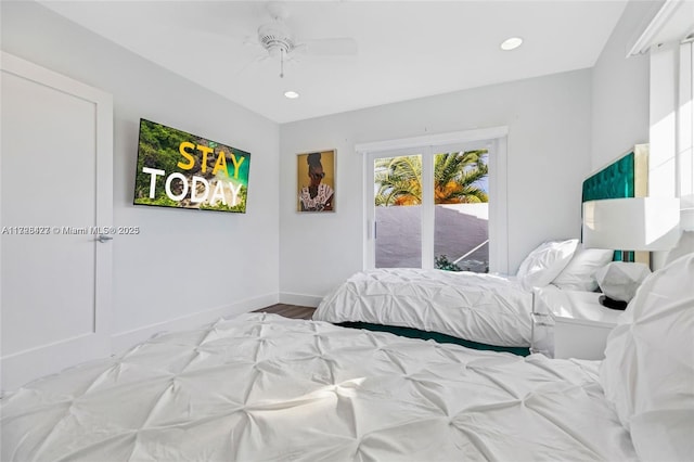 bedroom with ceiling fan, access to exterior, and wood-type flooring