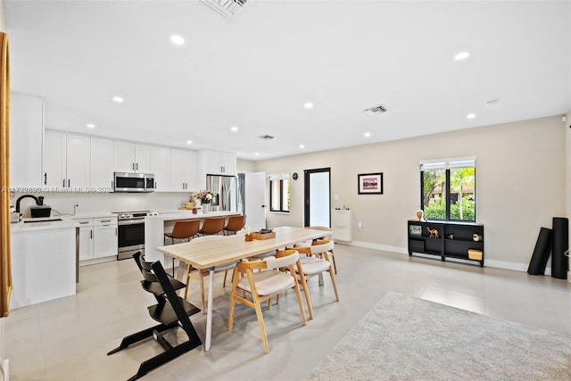 dining space with sink