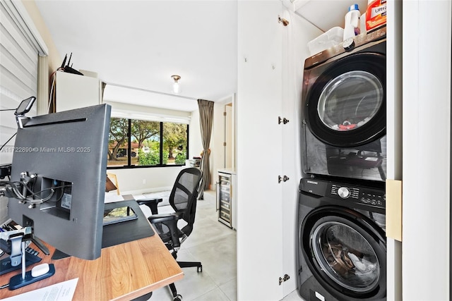 interior space with stacked washer and clothes dryer