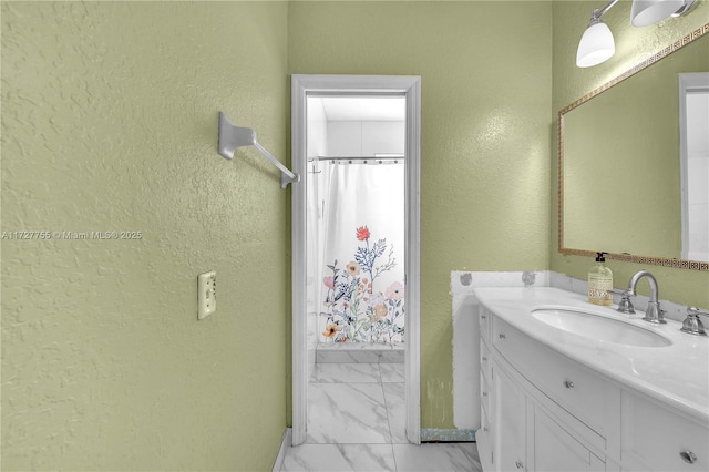 bathroom with vanity and a shower with shower curtain