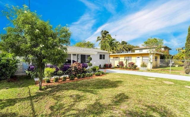 view of front of property with a front yard