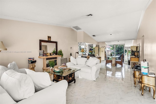 living room featuring ornamental molding and lofted ceiling