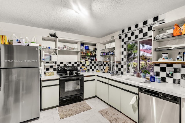 kitchen with decorative backsplash, sink, white cabinetry, a textured ceiling, and stainless steel appliances