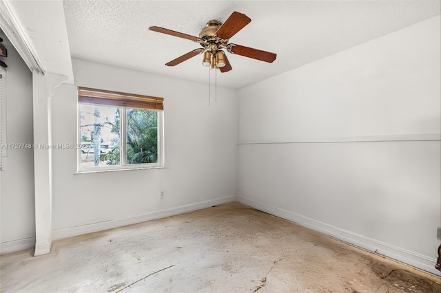 unfurnished room with ceiling fan