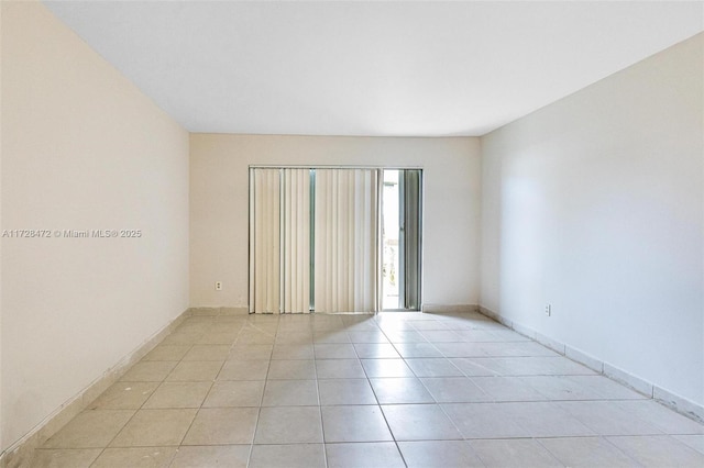 view of tiled spare room