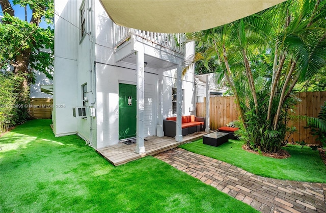 exterior space featuring a yard and an outdoor living space