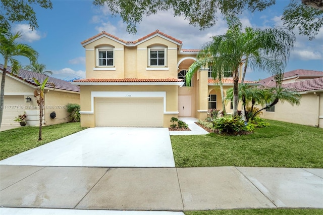 mediterranean / spanish-style house with a garage and a front lawn