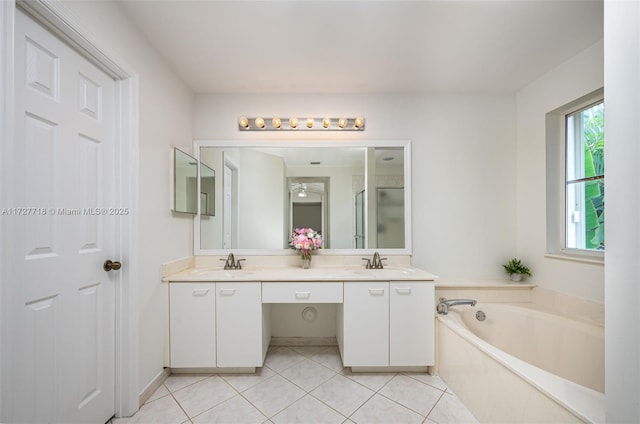 bathroom featuring vanity, tile patterned flooring, and independent shower and bath