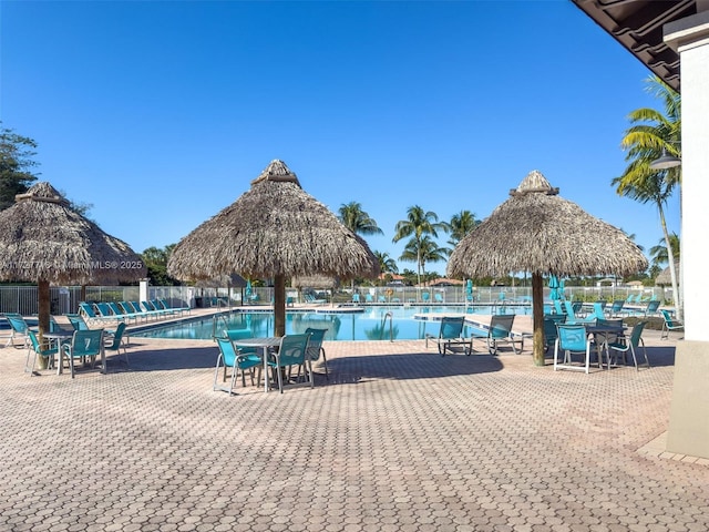 view of pool with a patio area and a gazebo