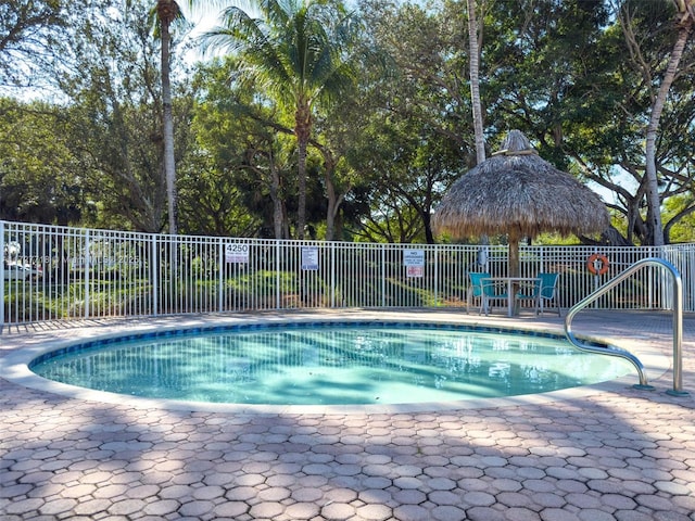 view of swimming pool featuring a gazebo