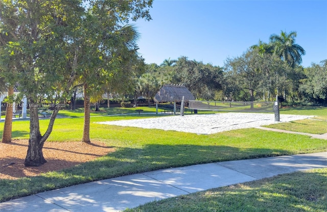 view of home's community with a gazebo, volleyball court, and a yard