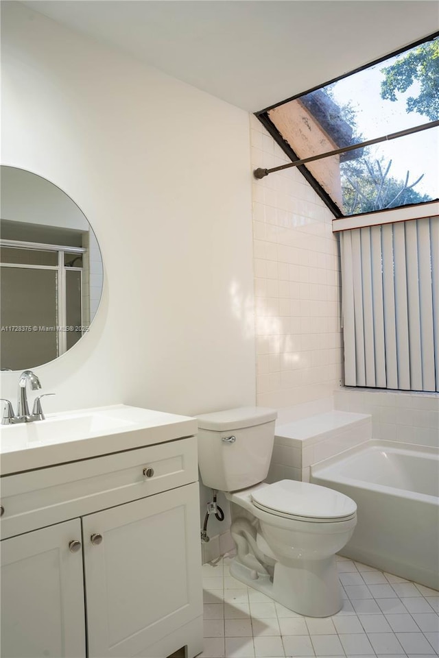 full bathroom featuring toilet, vanity, tile patterned floors, and shower with separate bathtub