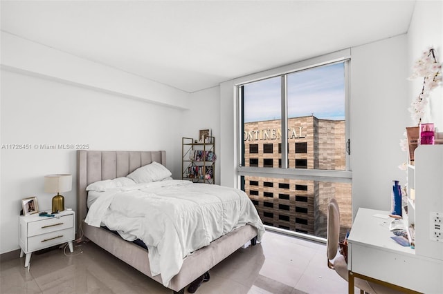 bedroom with expansive windows