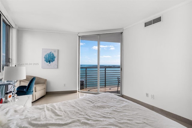 bedroom with floor to ceiling windows, ornamental molding, a water view, and access to outside