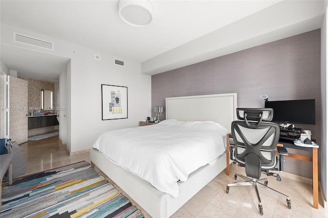 bedroom featuring light tile patterned floors