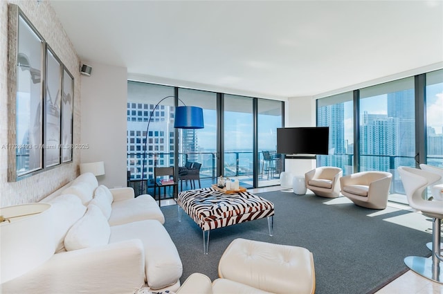 living room featuring a wall of windows