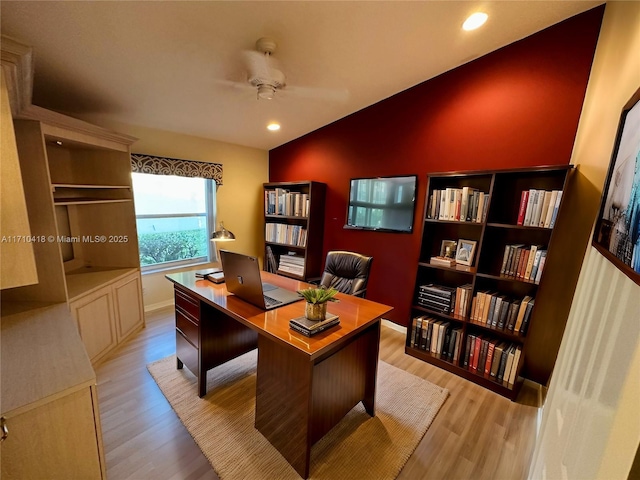 office featuring ceiling fan and light hardwood / wood-style floors