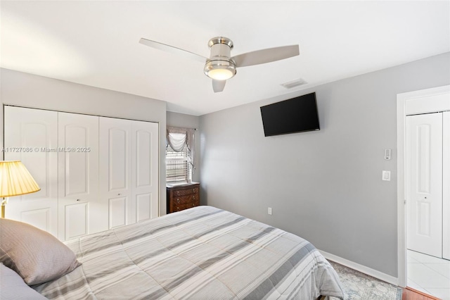 bedroom featuring ceiling fan and a closet