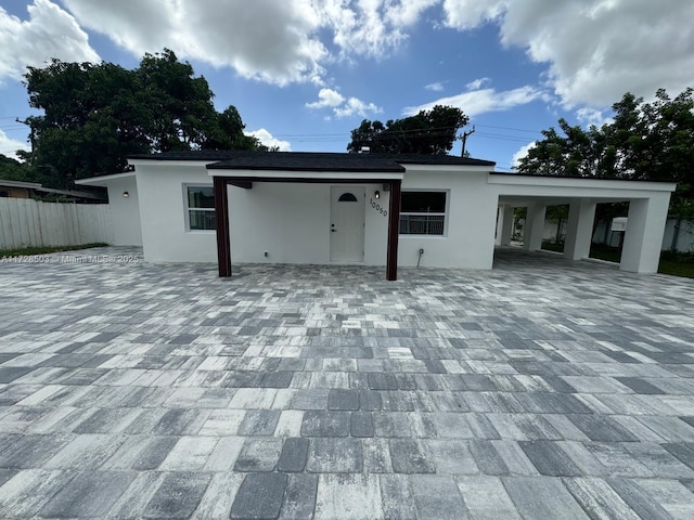 view of front of house featuring a carport