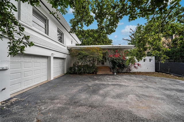 exterior space featuring a garage