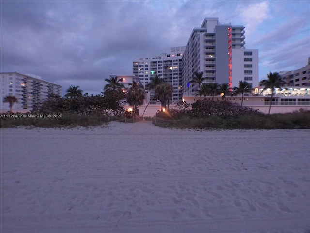 view of outdoor building at dusk