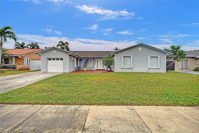 single story home with a front lawn and a garage